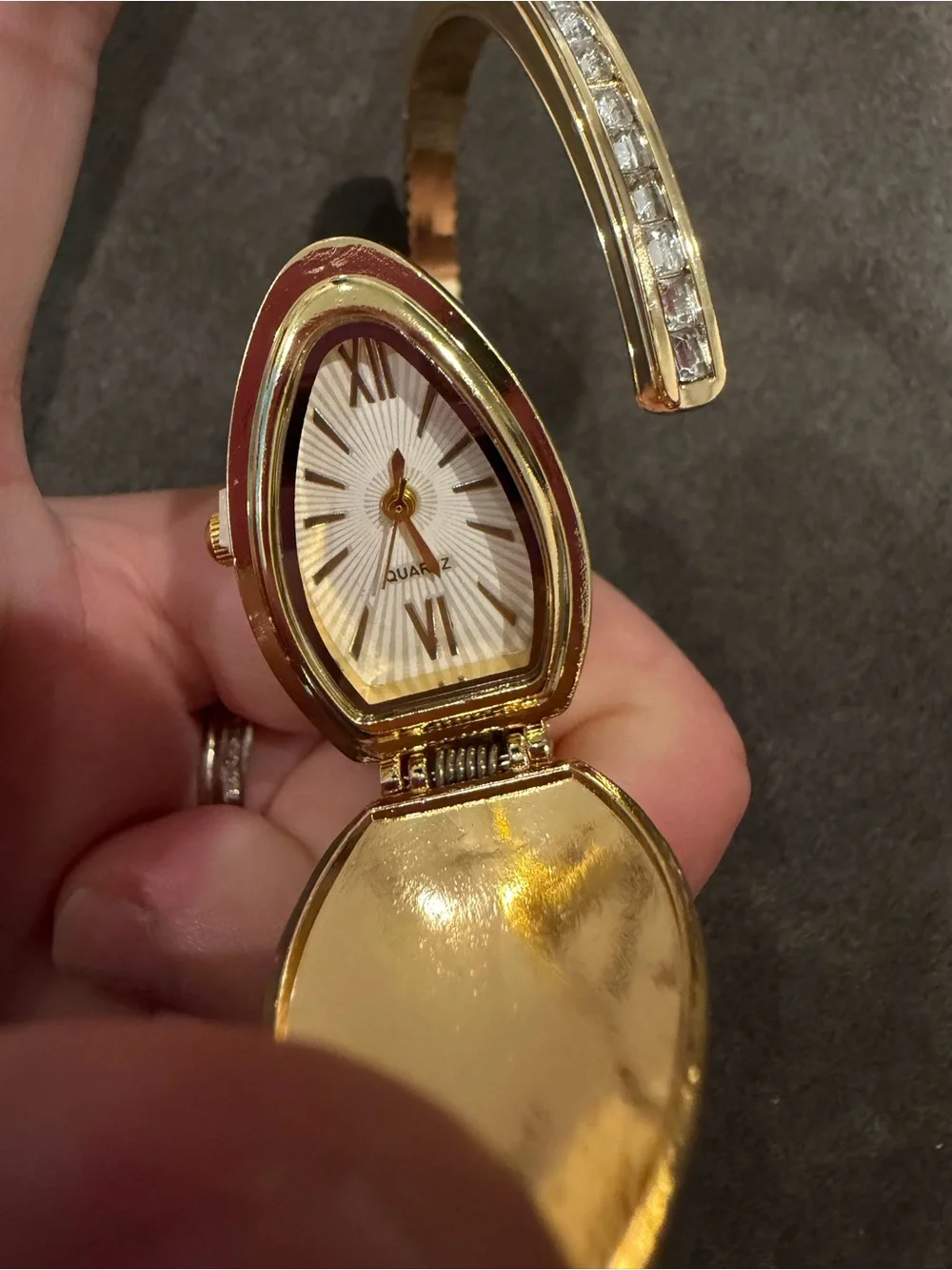 Gold-Tone Crystal Cuff Bracelet with Emerald Accents